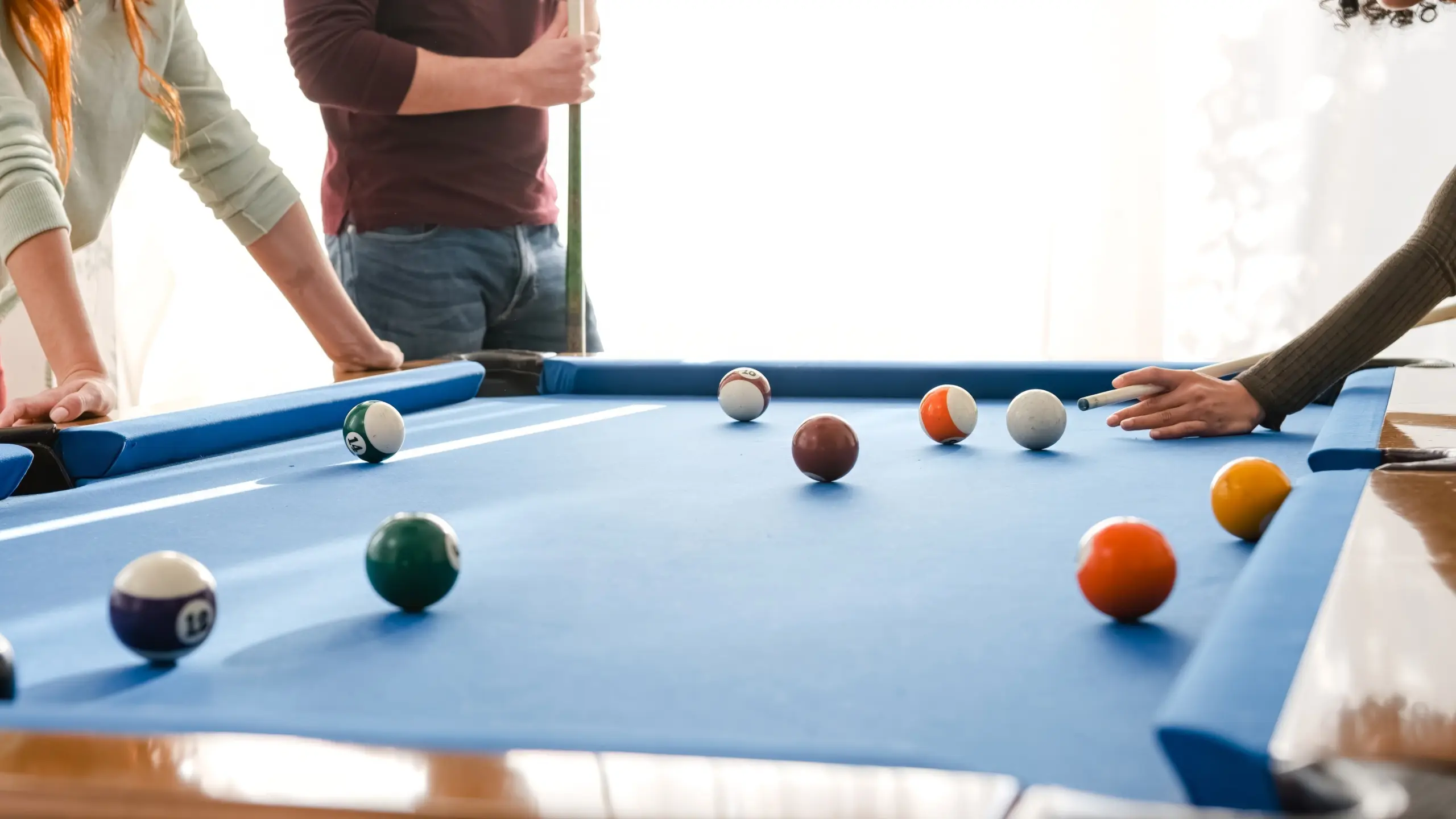 people egaging table pool as a part of their recovery